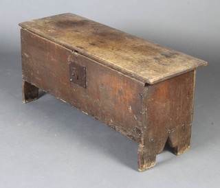 A 17th/18th Century oak coffer of panelled construction with hinged lid 45cm h x 98cm w x 35cm d 