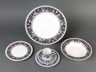A Wedgwood Florentine pattern part coffee and dinner service comprising 12 coffee cans, 12 saucers, 8 small plates, 8 medium plates, 6 dinner plates, 8 soup bowls and a sandwich plate 