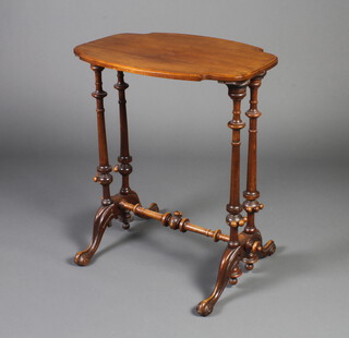 A Victorian shaped walnut occasional table raised on 4 turned supports with H framed stretcher 67cm h x 57cm w x 40cm d 
