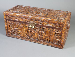 A Chinese carved camphor coffer with hinged lid, 43cm h x 97cm w x 44cm d 