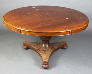 A William IV mahogany circular snap top breakfast table raised on turned column and triform base with bun feet 79cm h x 135cm diam