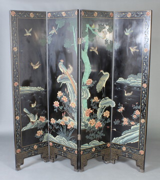 A Chinese black lacquered 4 fold dressing screen decorated birds 185cm h x 46cm when closed x 227cm when open 