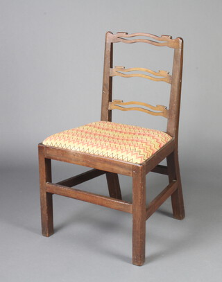 A George III mahogany London ladder back chair with upholstered drop in seat, raised on square supports and box framed stretcher 