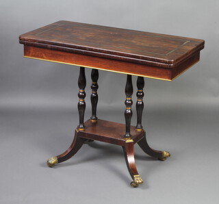 A Victorian Continental rosewood and inlaid brass card table raised on 4 turned columns with platform base, outswept supports 75cm h x 92cm w x 45cm d 