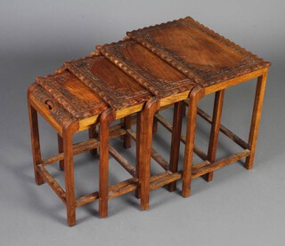 A nest of 4 Burmese hardwood interfitting coffee tables 46cm h x 45cm w x 34cm d