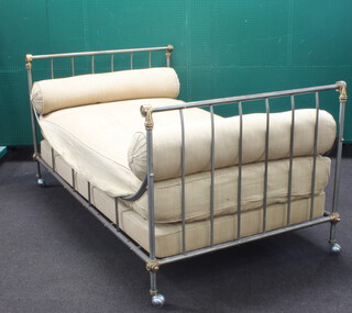 A 19th/20th Century American polished steel and brass campaign bed complete with mattress and 2 bolsters 94cm h x 193cm l x 109cm w 