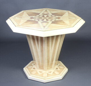 Mid 20th Century, an octagonal faux marble centre table, raised on a chamfered octagonal column and base 72cm x 90cm x 90cm 