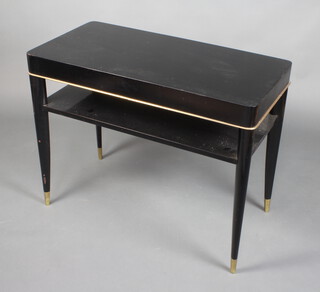 An Art Deco rectangular ebonised 2 tier coffee table with gilt metal mounts 70cm h x 91cm l x 47cm d, the base marked 90 0851 Maabille 