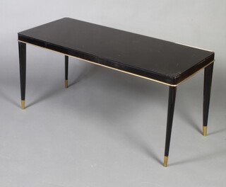 A rectangular Art Deco style ebonised coffee table with gilt metal trim 56cm x 120cm w x 51cm d 