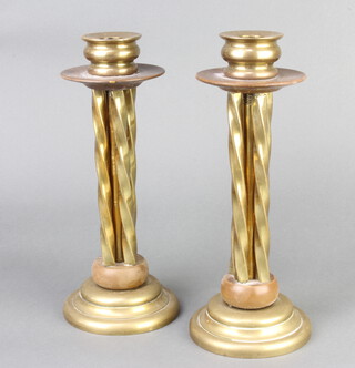 A pair of 19th/20th Century brass and brown bakelite candlesticks 26cm h x 9cm 