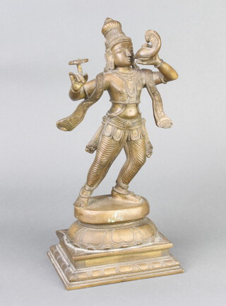 A bronze figure of a standing Eastern deity raised on a square base 29cm x 14cm x 11cm 