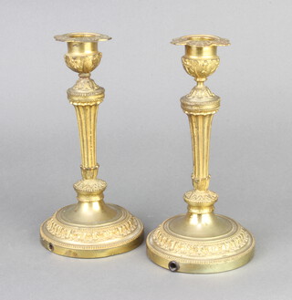 A pair of 18th Century style gilt metal candlesticks with detachable sconces converted for use as table lamps 19cm x 9cm 
