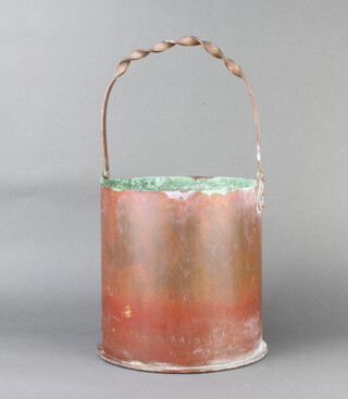 A German First World War trench art shell, the base marked Karlsruhe April 1917, converted for use as a coal bucket with wrought swing handle 23cm x 22cm 