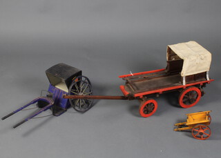 A wooden model of a half covered 19th Century cart 28cm x 81cm x 21cm, 1 other model cart 12cm x 19cm x 10cm, a model Hansom cab (axle f) 
