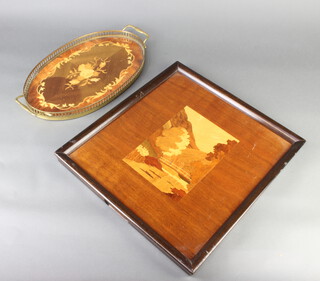 An Art Nouveau inlaid mahogany tray/panel with parquetry landscape decoration 38cm x 41cm together with an oval Sorrento style twin handled tray with gilt gallery 30cm x 41cm x 23cm 