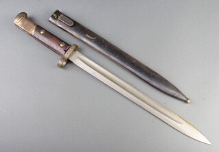 A Continental Mauser bayonet with 30cm blade complete with scabbard marked E3/48 TG 