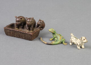 A bronze cold painted figure of a dog 2cm, ditto lizard 3cm and a bronze figure of 3 piglets at the trough 2cm, 4cm and 2cm 