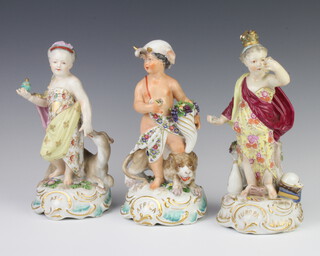 A pair of Samson style figures - Asia and Africa, one with a camel at her feet, the other a lion, raised on rococo bases 22cm together with a similar of Europa 23cm 
