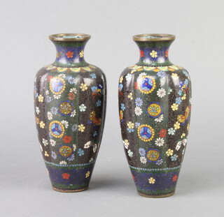 A pair of 19th Century Japanese black ground and floral patterned cloisonne club shaped vases with ribbed decoration 18cm x 5cm  
