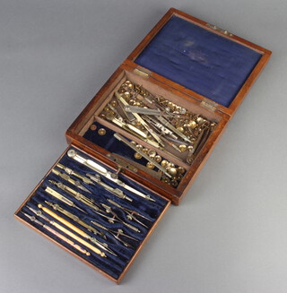 A 19th Century part geometry set contained in a mahogany case with hinged lid 