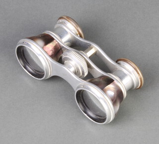 A pair of chrome and mother of pearl opera glasses (missing 1 section of mother of pearl)