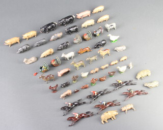 A collection of 6 Totopoly horses and jockeys, together with a collection of farm animal figures including  7 black pigs, 1 British black piglet, 5 turkeys (1f), 9 pigs, 6 piglets, 5 goats, 6 sheep, 3 geese, 4 chicken, 2 rabbits, hare and a small horse 
