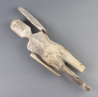 A 19th Century carved wooden figure of a swimmer 32cm