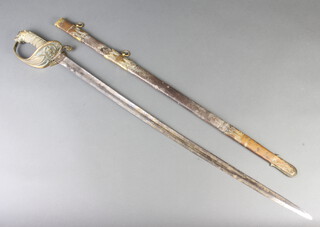 E Ridge, a Victorian Naval officer's sword with plain blade, complete with scabbard and together with a photocopied photograph of the former owner Captain Arthur Reginald Raby wearing the uniform of a Commander 