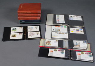 Seven albums of Elizabeth II GB first day covers and 3 albums of PHQ cards 