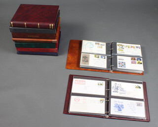 A box containing 9 albums of GB first day covers 