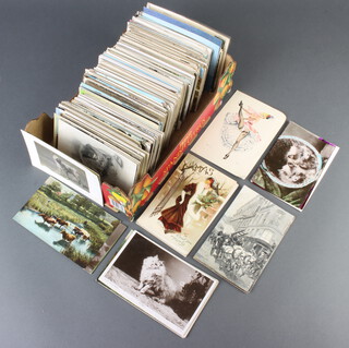 A quantity of black and white and coloured postcards