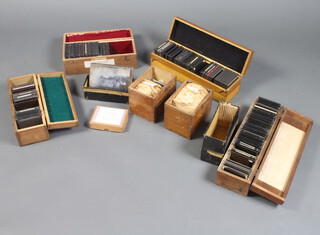 A collection of various glass photographic slides, 19th Century Eastern scenes, together with 4 shallow boxes of glass slides 