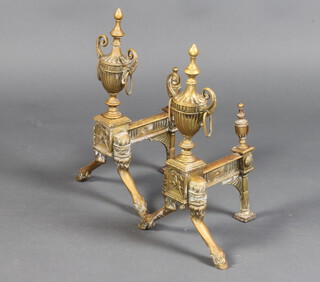 A pair of 19th Century Adam style brass fire dogs in the form of lidded urns 45cm h x 22cm w x 26cm d 