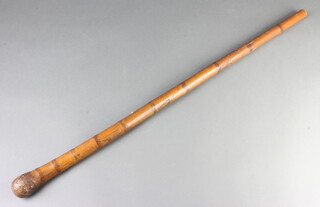 A 19th Century bamboo walking stick carved Geishas 