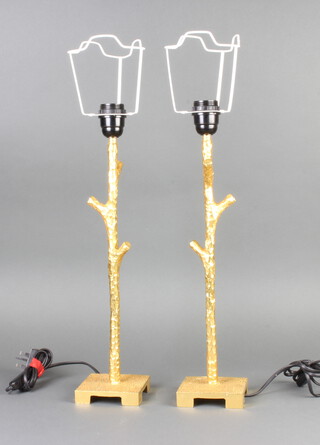 Fondica, a pair of stylish barked gilt bronze table lamps in the form of trees, the bases marked Fondica 2004 CE 40cm h x 10cm w x 10cm d  