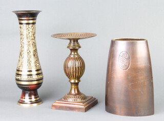 A bronze boat shaped vase of waisted form 20cm h x 8cm w x 14cm d, a bronzed finished pedestal on a square base 22cmx 10cm and an Indian engraved club shaped vase 29cm x 9cm 