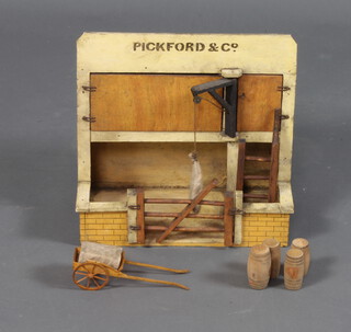 A 19th Century painted wooden model of a Pickford and Company Flower Stall with sacks, barrels and hand cart 31cm x 33cm x 18cm 