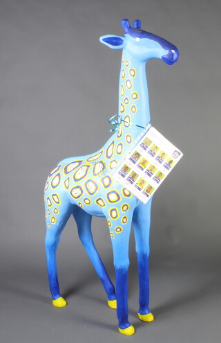 A papier mache figure of a giraffe, signed by the 2013/14 Chelsea FC Football team 161cm h x 70cm w x 40cm  
