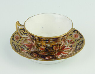 A Royal Crown Derby Imari pattern miniature tea cup and saucer 