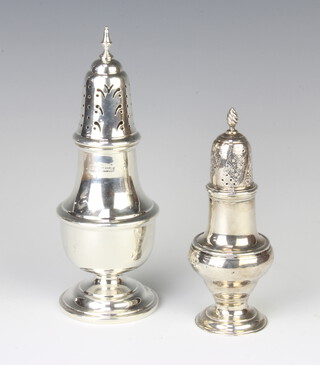 A Queen Anne style silver sugar shaker Birmingham 1972, a smaller ditto indistinct marks 197 grams