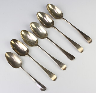 Six Georgian silver table spoons, rubbed marks, 352 grams