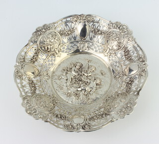 A Continental 800 standard circular pierced basket decorated with cavorting cherubs and flowers 21cm, 240 grams 