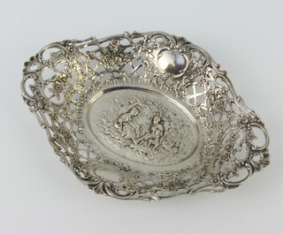 A Continental 800 standard shaped repousse dish decorated with fete gallant scene surrounded by flowers, 20cm, 180 grams
