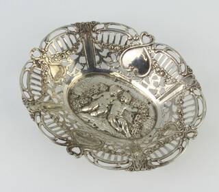 A Continental 800 standard oval repousse pierced dish decorated with cherubs 13cm, 66 grams