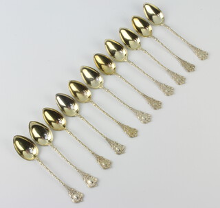 Eleven 800 standard silver gilt fancy teaspoons 85 grams 