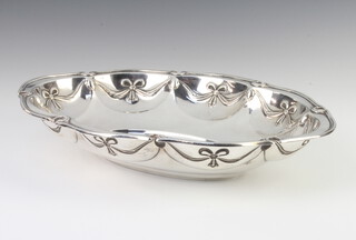 A repousse silver bowl with ribbon decoration, London 1912, 234 grams, 26cm 