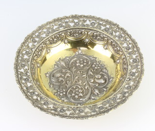 A Victorian repousse silver circular bowl decorated with flowers, London 1897, maker James Wakely and Frank Wheeler 17.5cm, 220 grams 