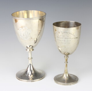 A Victorian silver cup London 1874, a smaller ditto with rubbed marks, 440 grams