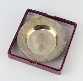 A silver Armada dish with engraved monogram London 1986, 110 grams