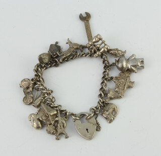 A silver charm bracelet 72 grams